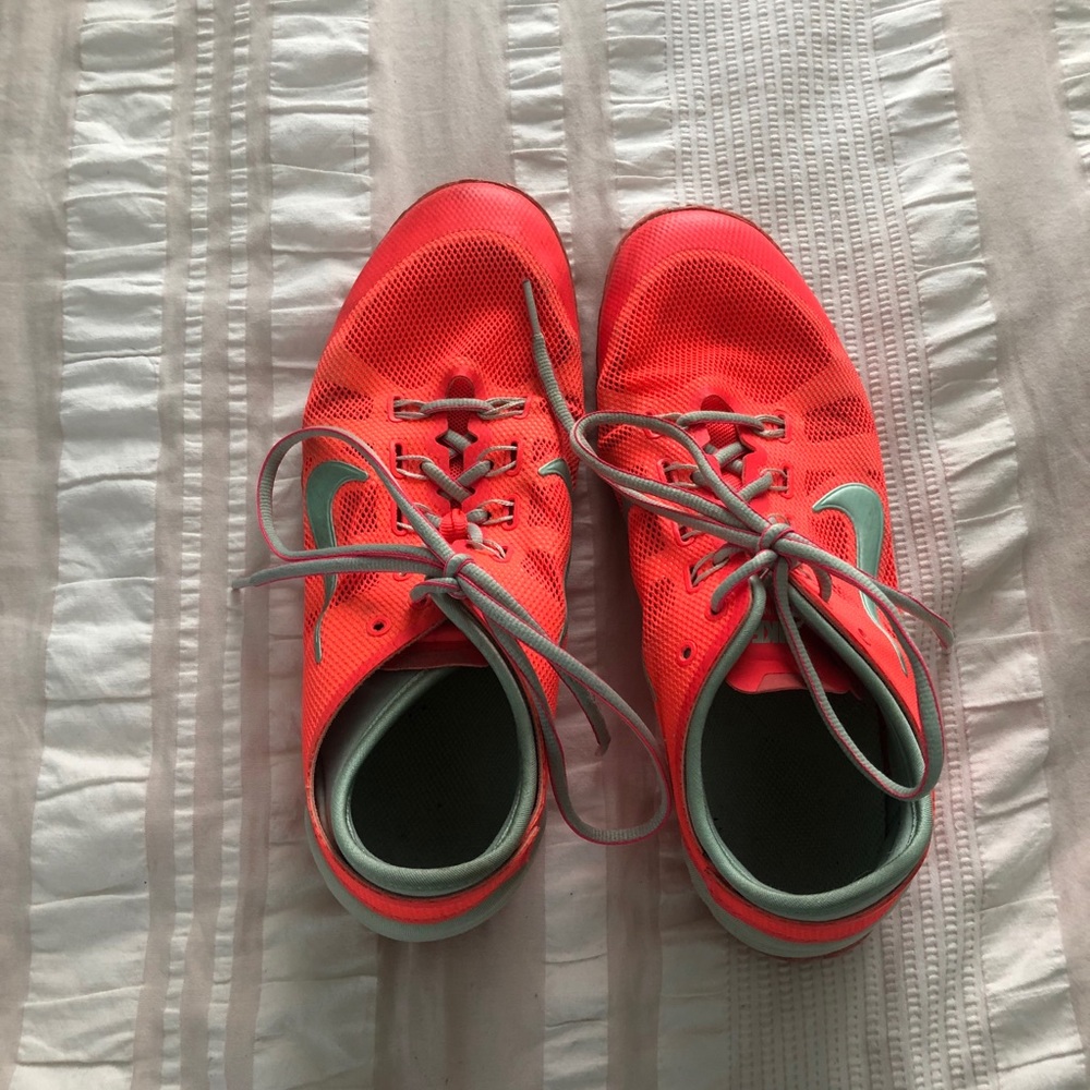 Orange Nike Training shoes. Size 8.5